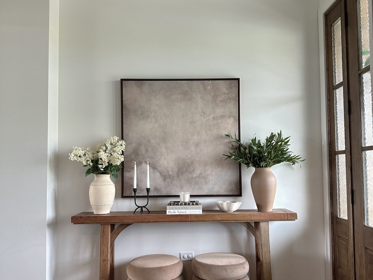 The entry, with a console table and layered styling